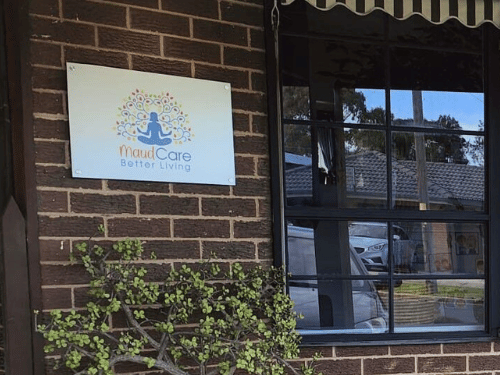 Maudcare sign on front brick wall at Corio facility