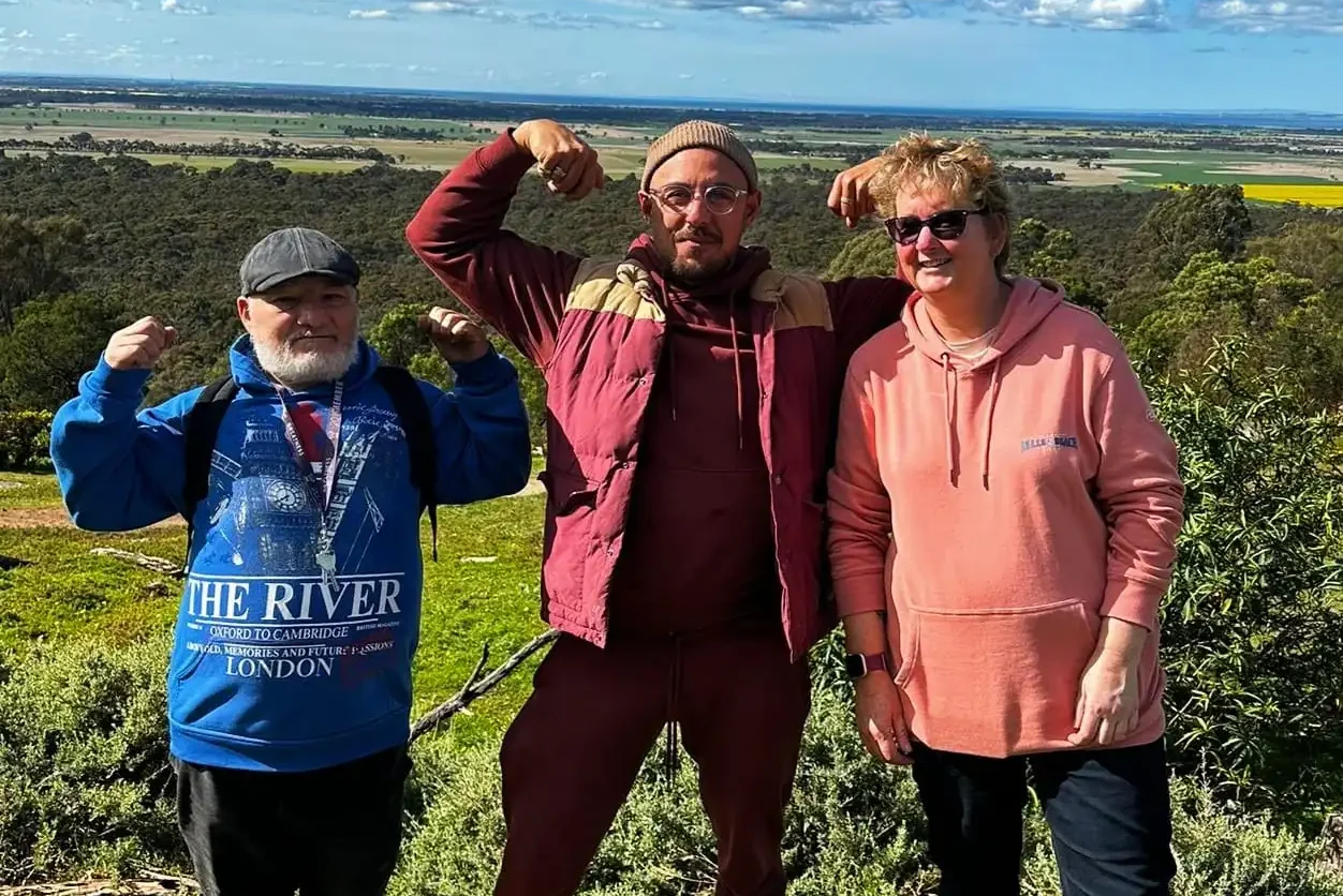 Two NDIS participants and support worker on a hike