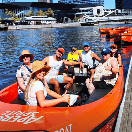 Group of people riding a boat