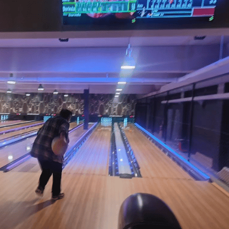 A woman bowling