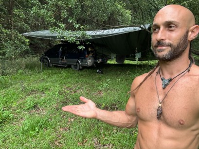 A man showing his van
